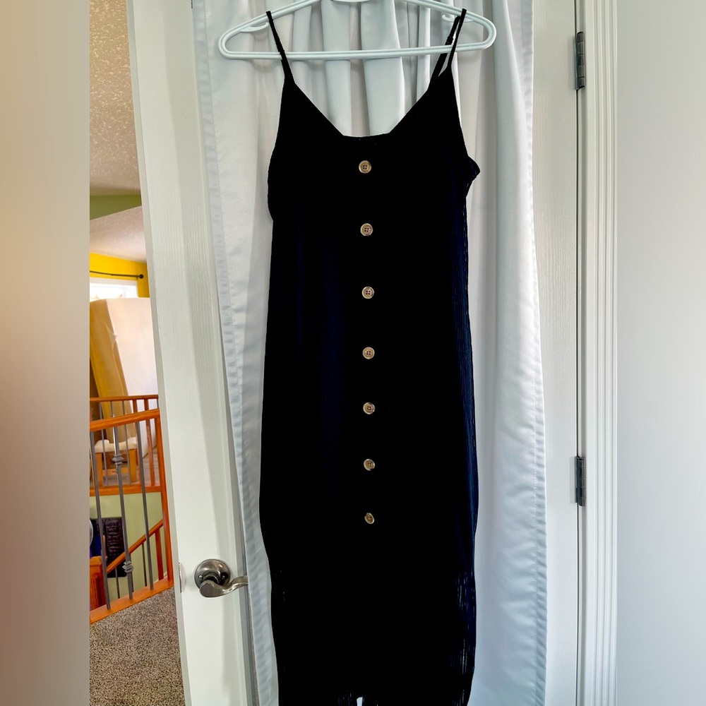 Black maxi light weight knot dress with spaghetti straps and wood buttons